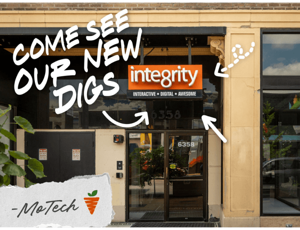 IntegrityXD storefront in the Delmar Loop with a hand-lettered 'Come See Our New Digs' greeting from MoTech